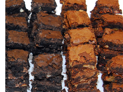 4 rows of ooey and gooey stacked brownies